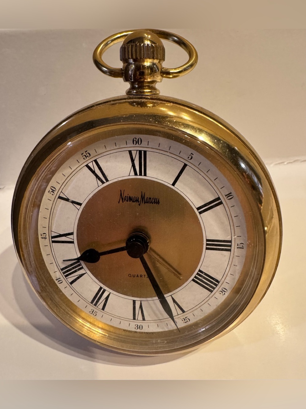 Neiman Marcus Gold and White Roman Numeral Stand Clock